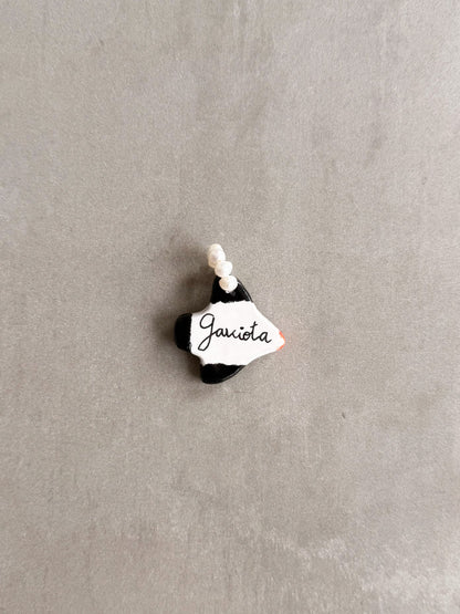 Parte trasera del charm gaviota hecho a mano en porcelana | esdeinés